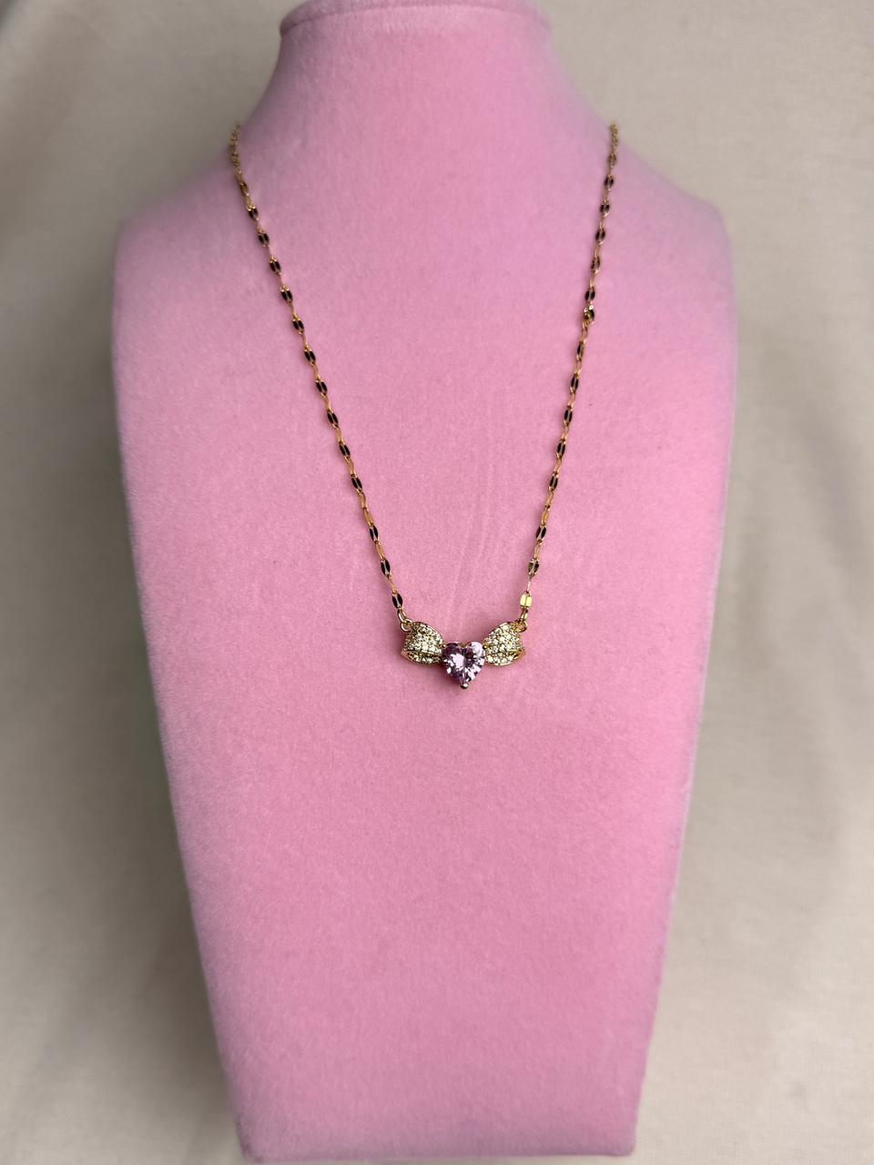 Collar  - Moño con piedra rosa