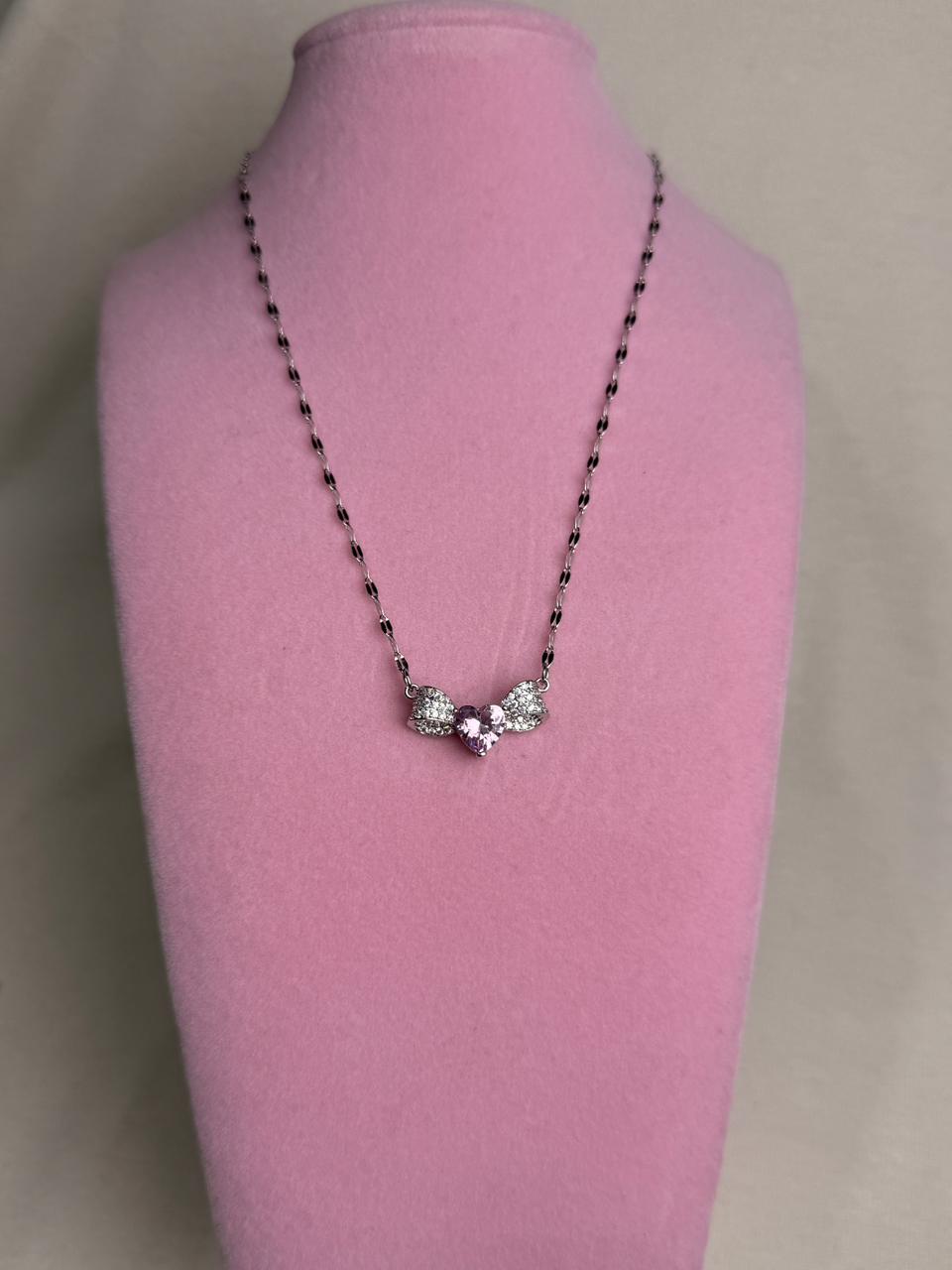 Collar  - Moño con piedra rosa